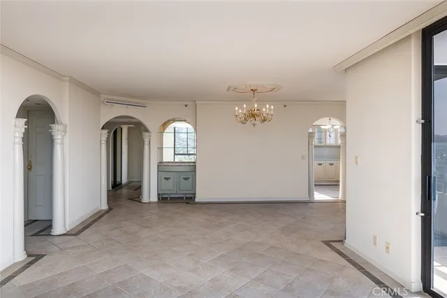 a view of a hallway with a bathroom