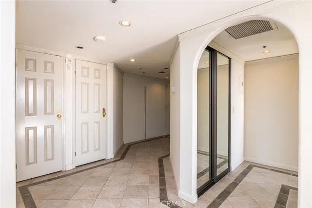 a view of a kitchen with stainless steel appliances granite countertop a stove and a sink