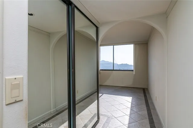 a bathroom with a granite countertop sink a toilet and a bathtub