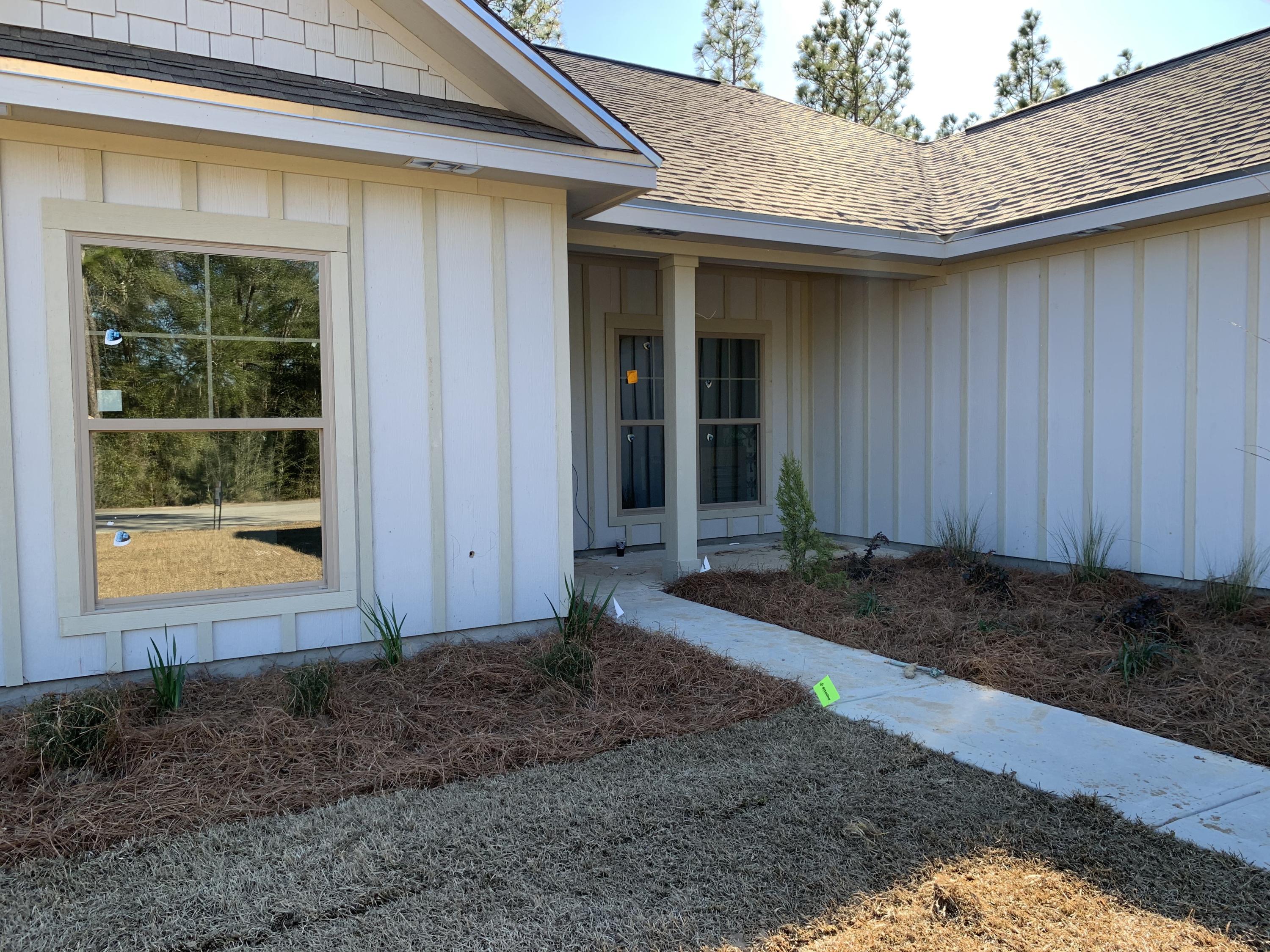 311 Arroyo Hondo Terrace Crestview, FL 32536 - Photo 3 of 12 a front view of a house