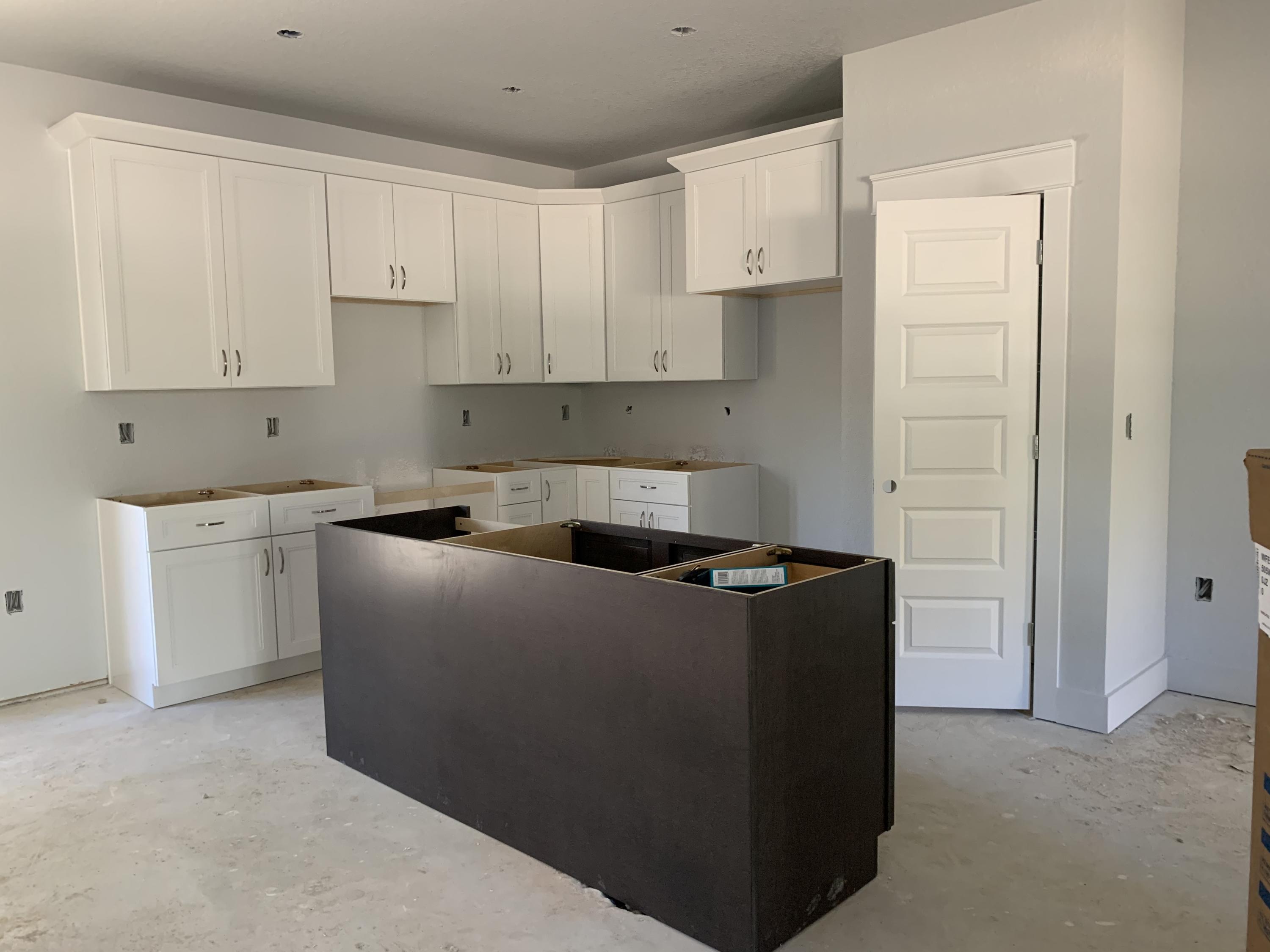 311 Arroyo Hondo Terrace Crestview, FL 32536 - Photo 5 of 12 a kitchen with cabinets and window