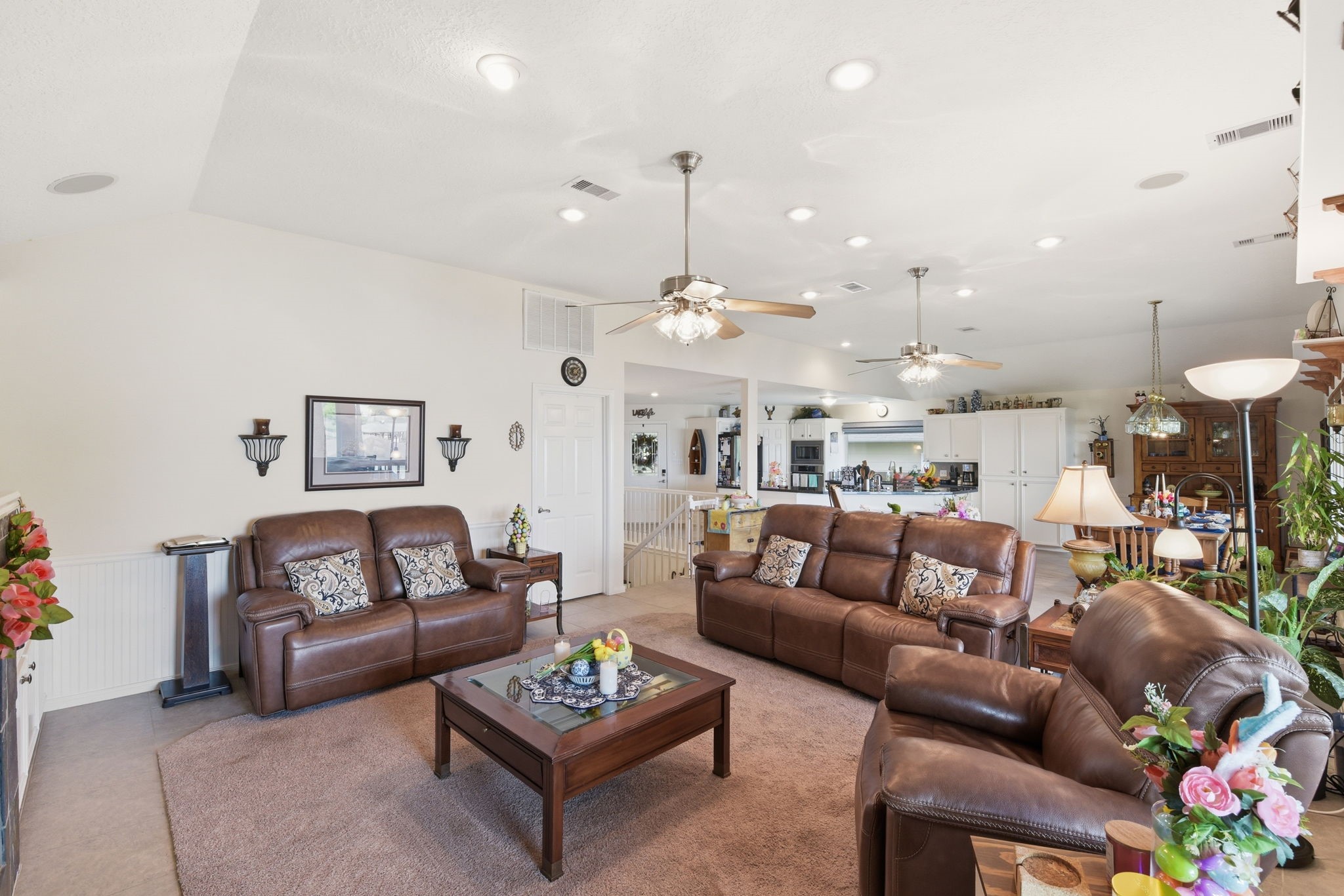 201 Lords Circle Coldspring, TX 77331 - Photo 19 of 48 a living room with furniture kitchen and a chandelier