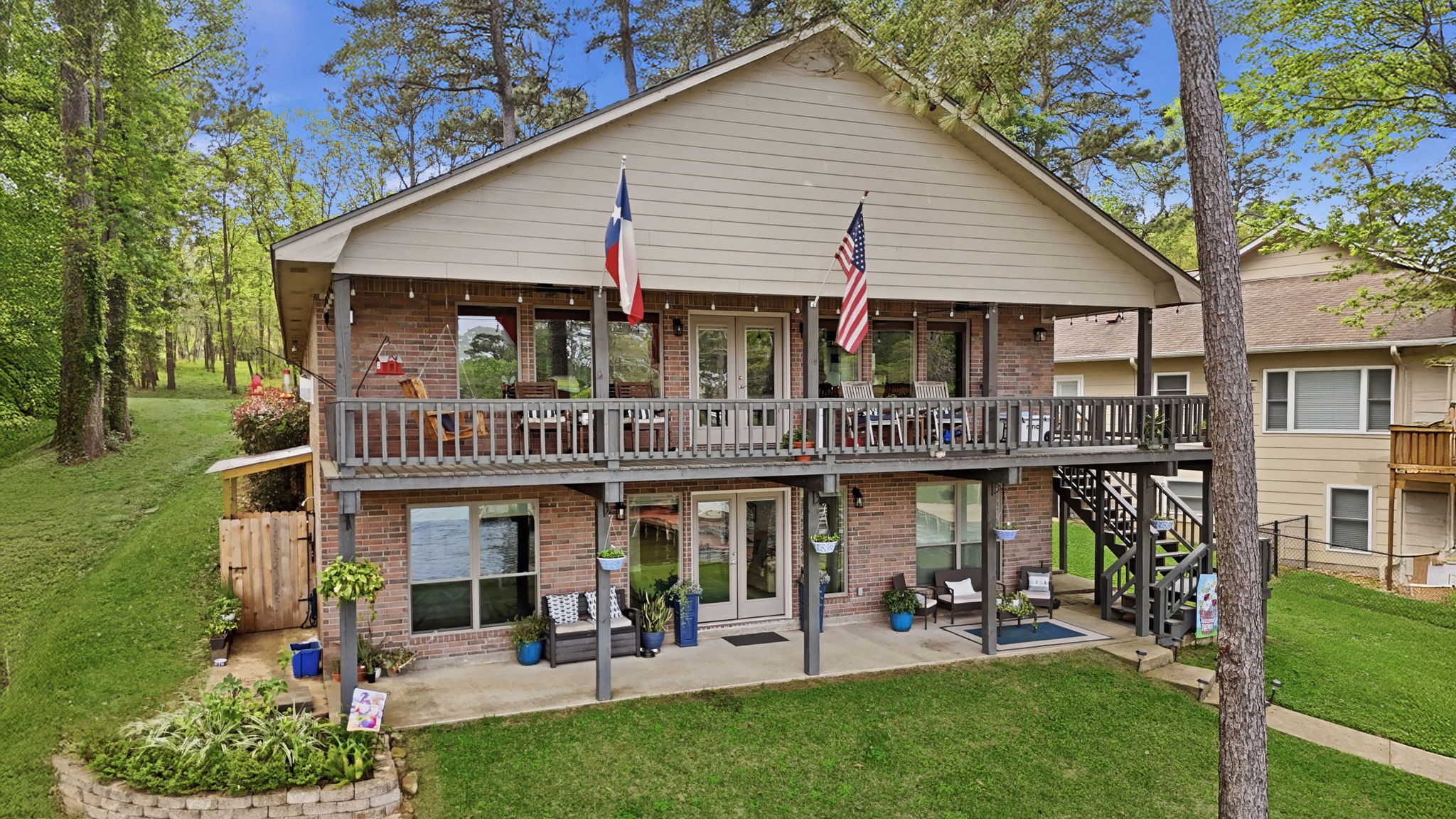 201 Lords Circle Coldspring, TX 77331 - Photo 44 of 48 a front view of a house with garden and porch