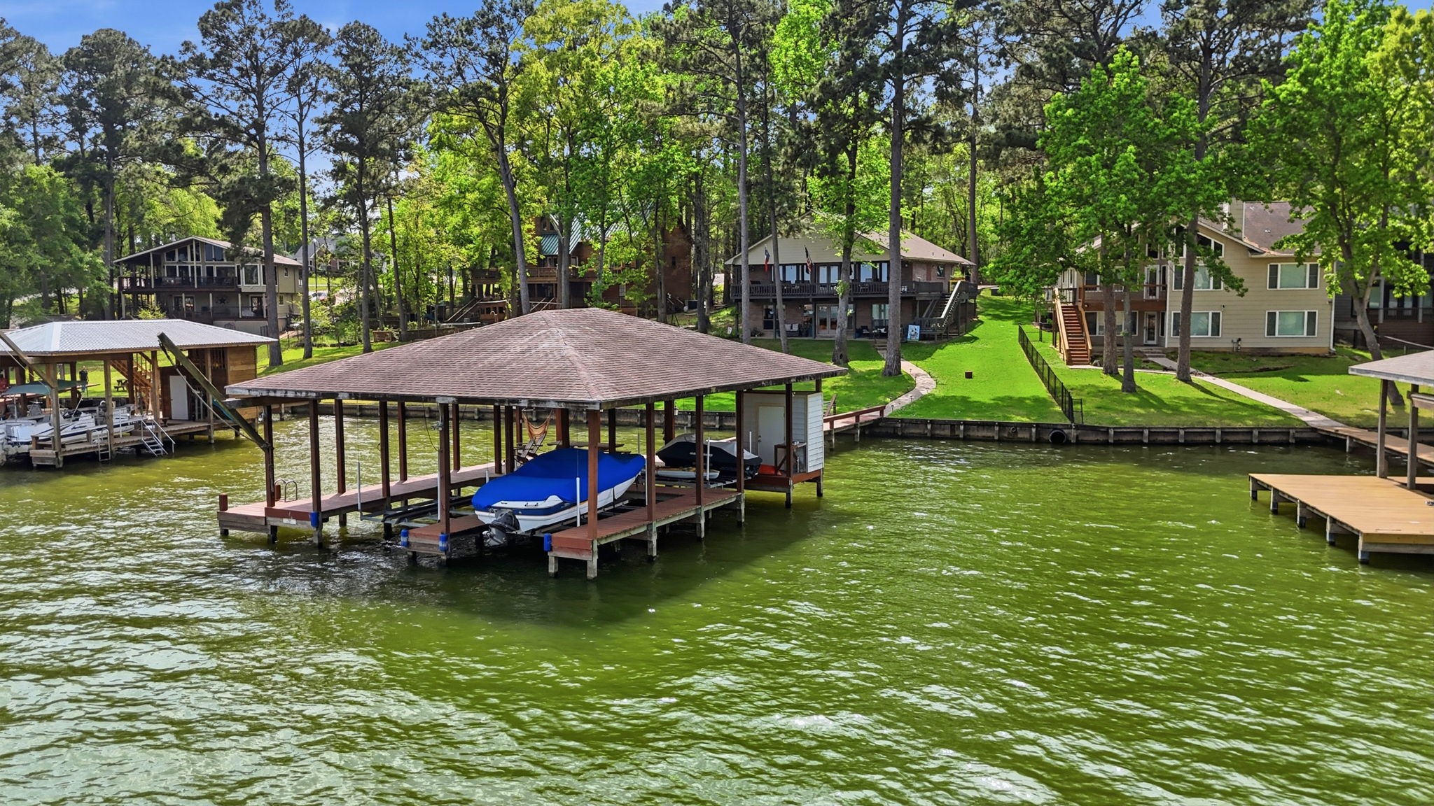 201 Lords Circle Coldspring, TX 77331 - Photo 45 of 48 a backyard of a house with yard table and chairs