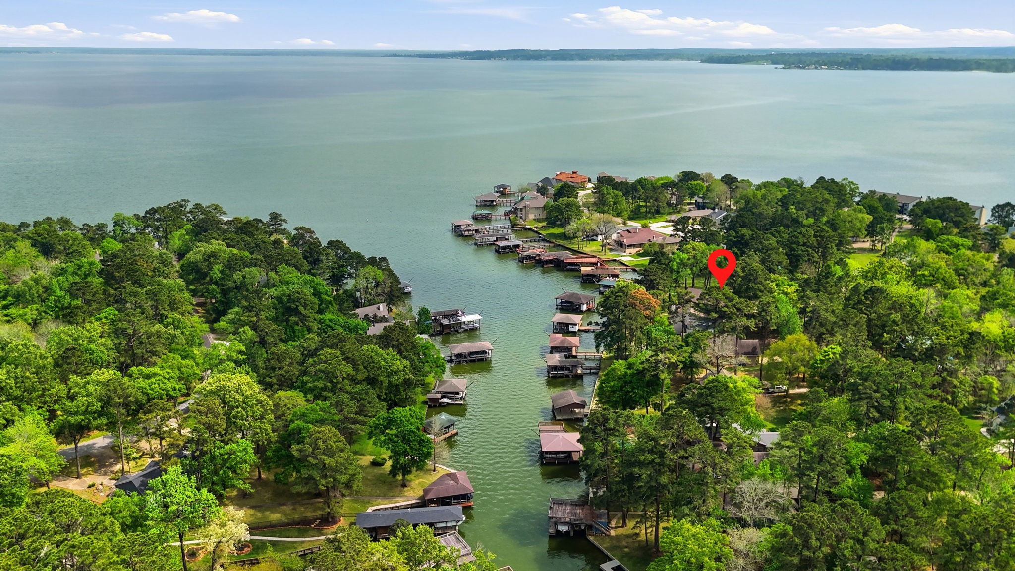 201 Lords Circle Coldspring, TX 77331 - Photo 47 of 48 a view of a lake with a lake