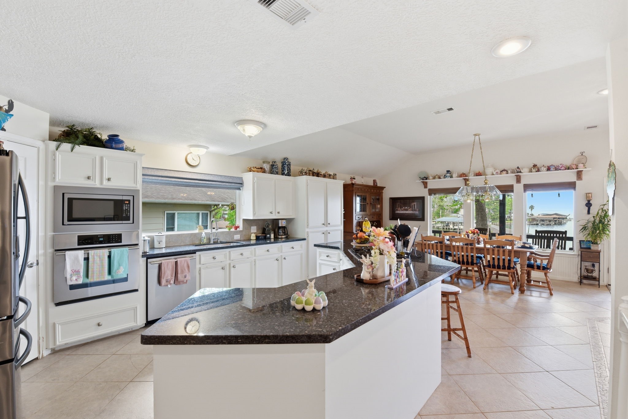 201 Lords Circle Coldspring, TX 77331 - Photo 10 of 48 a large kitchen with a large counter top appliances and cabinets