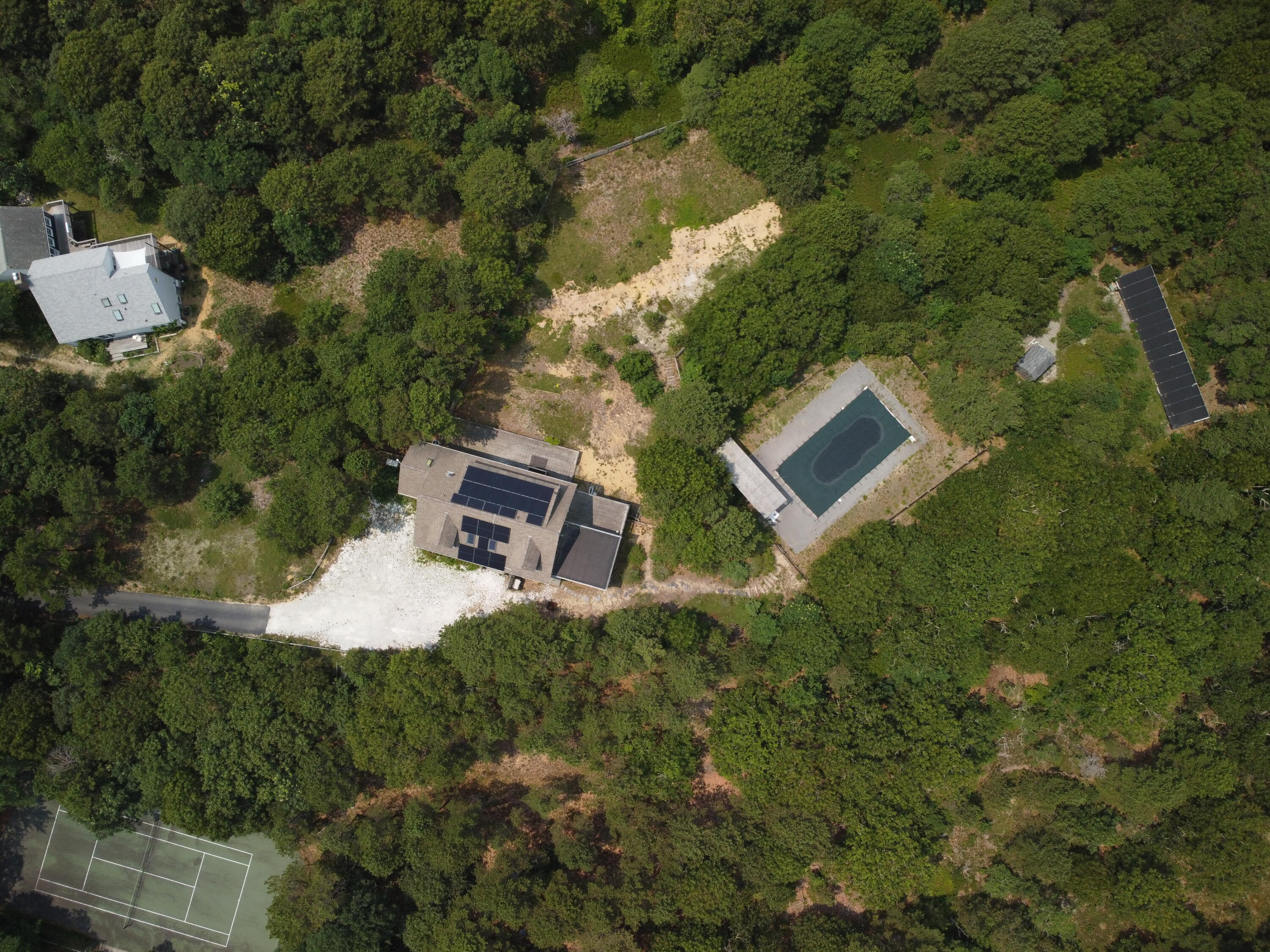 11 Cooper Road Truro, MA 02666 - Photo 5 of 8 an aerial view of a house with a yard