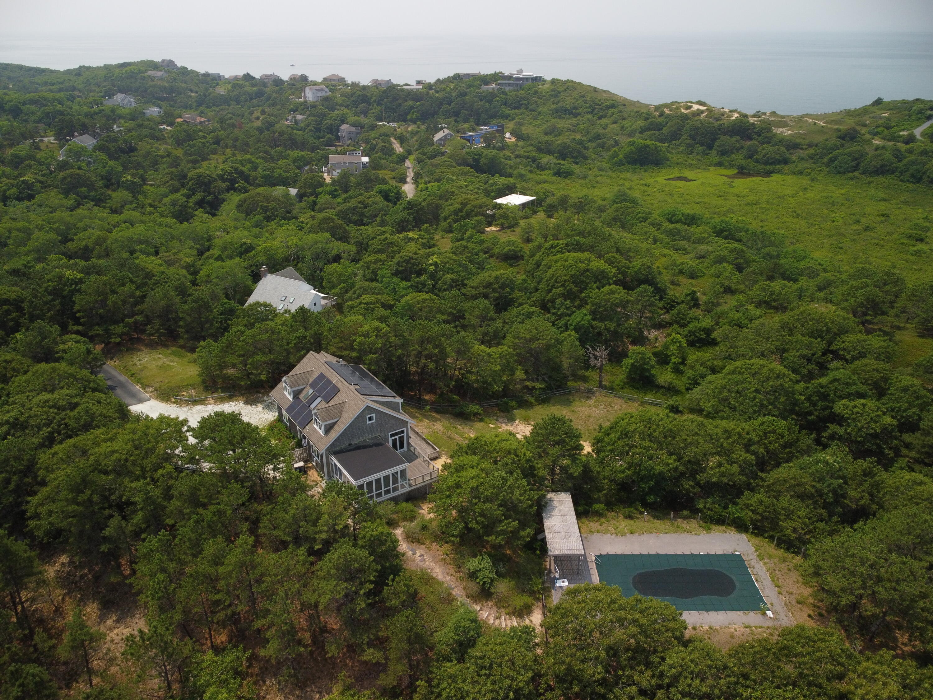 11 Cooper Road Truro, MA 02666 - Photo 6 of 8 an aerial view of a house with a yard