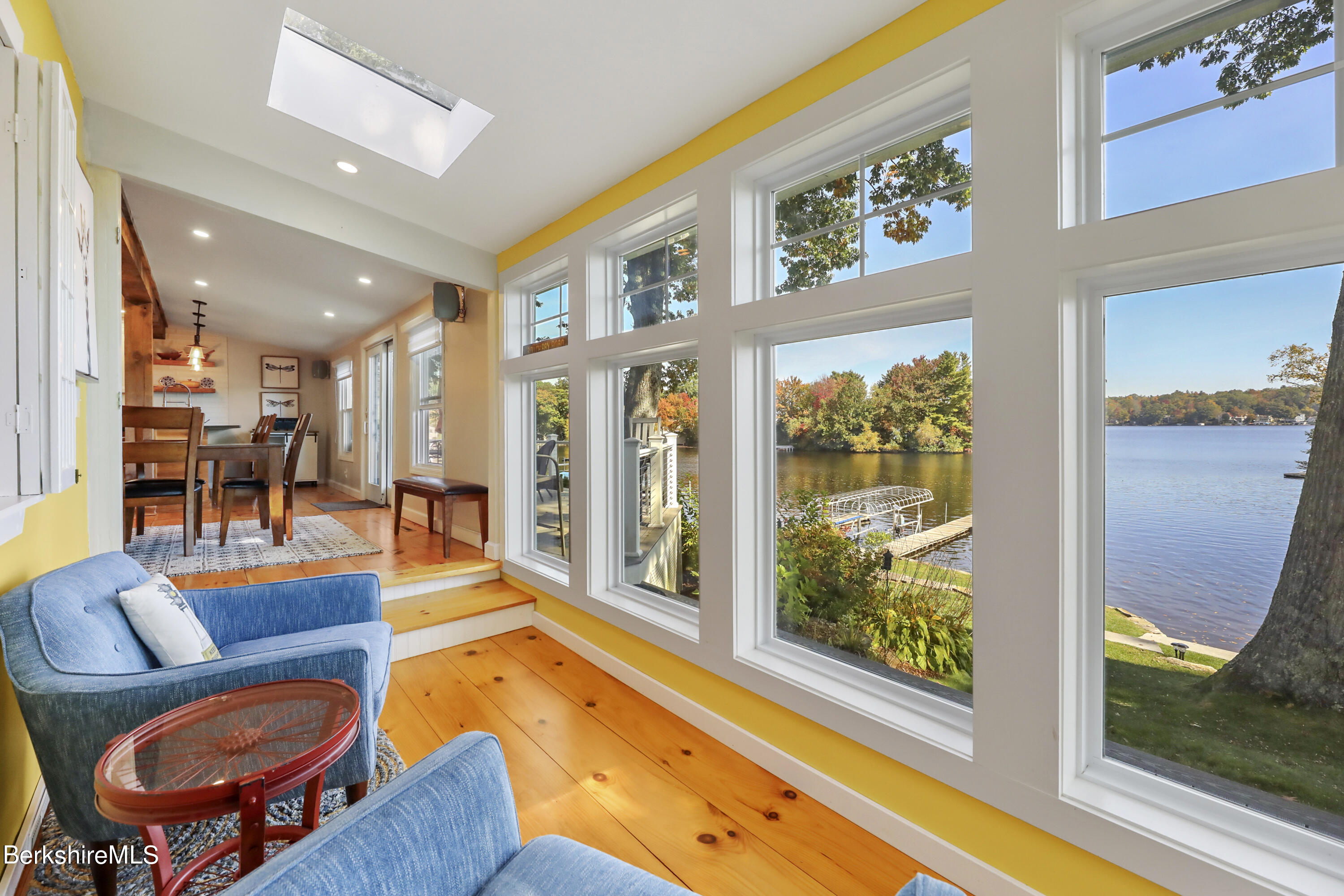29 South Bay Road Otis, MA 01029 - Photo 14 of 27 a living room with furniture fireplace and a large window