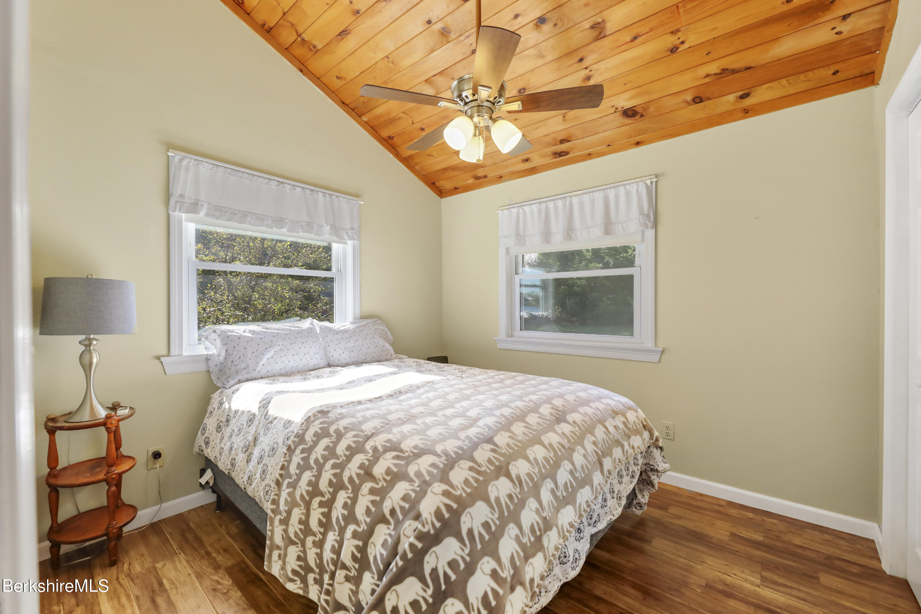 29 South Bay Road Otis, MA 01029 - Photo 19 of 27 a bedroom with a bed and a window with outer view