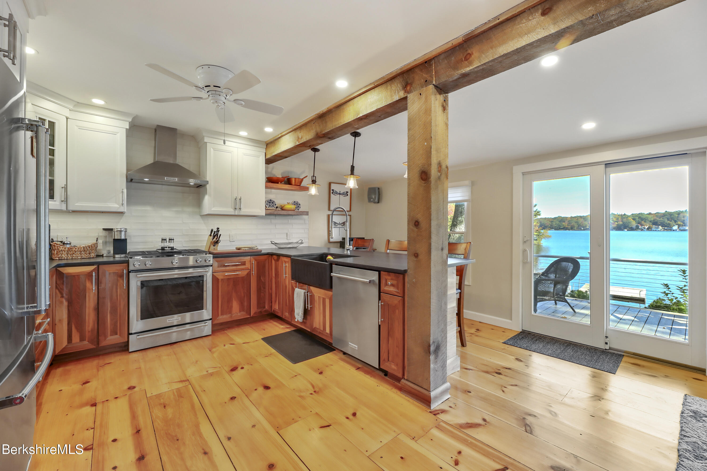 29 South Bay Road Otis, MA 01029 - Photo 7 of 27 a large kitchen with stainless steel appliances granite countertop a stove a sink dishwasher and a refrigerator