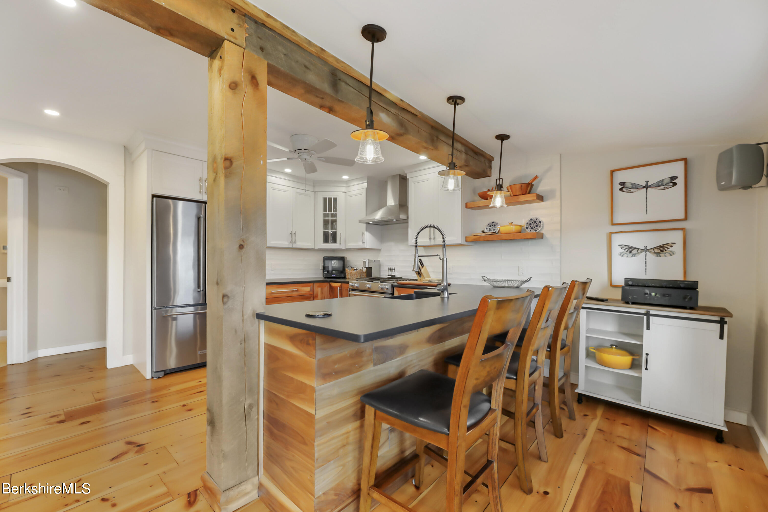 29 South Bay Road Otis, MA 01029 - Photo 9 of 27 a kitchen with a sink a stove and a refrigerator