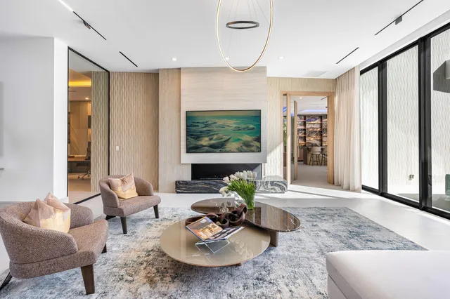a bathroom with a granite countertop sink a mirror and a shower
