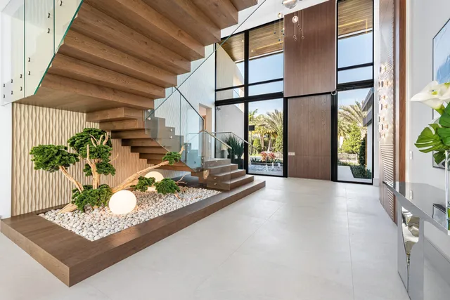 a view of a dining room with furniture and window