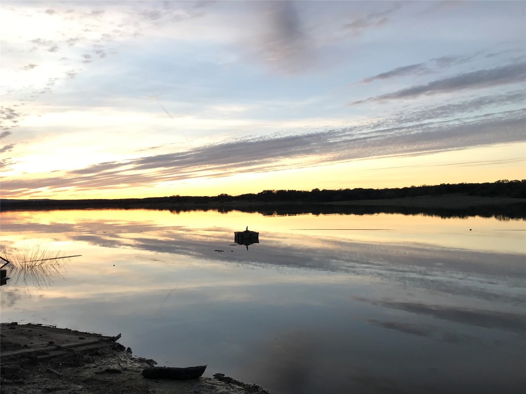 3 Wesley Ridge Drive Spicewood, TX 78669 - Photo 2 of 3 a view of an ocean and beach