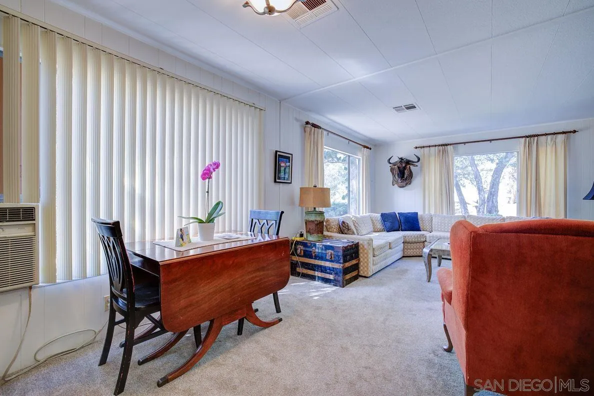 31050 Lilac Road Valley Center, CA 92082 - Photo 12 of 35 a living room with furniture and a window