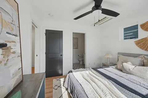 a bedroom with a bed and a walk in closet