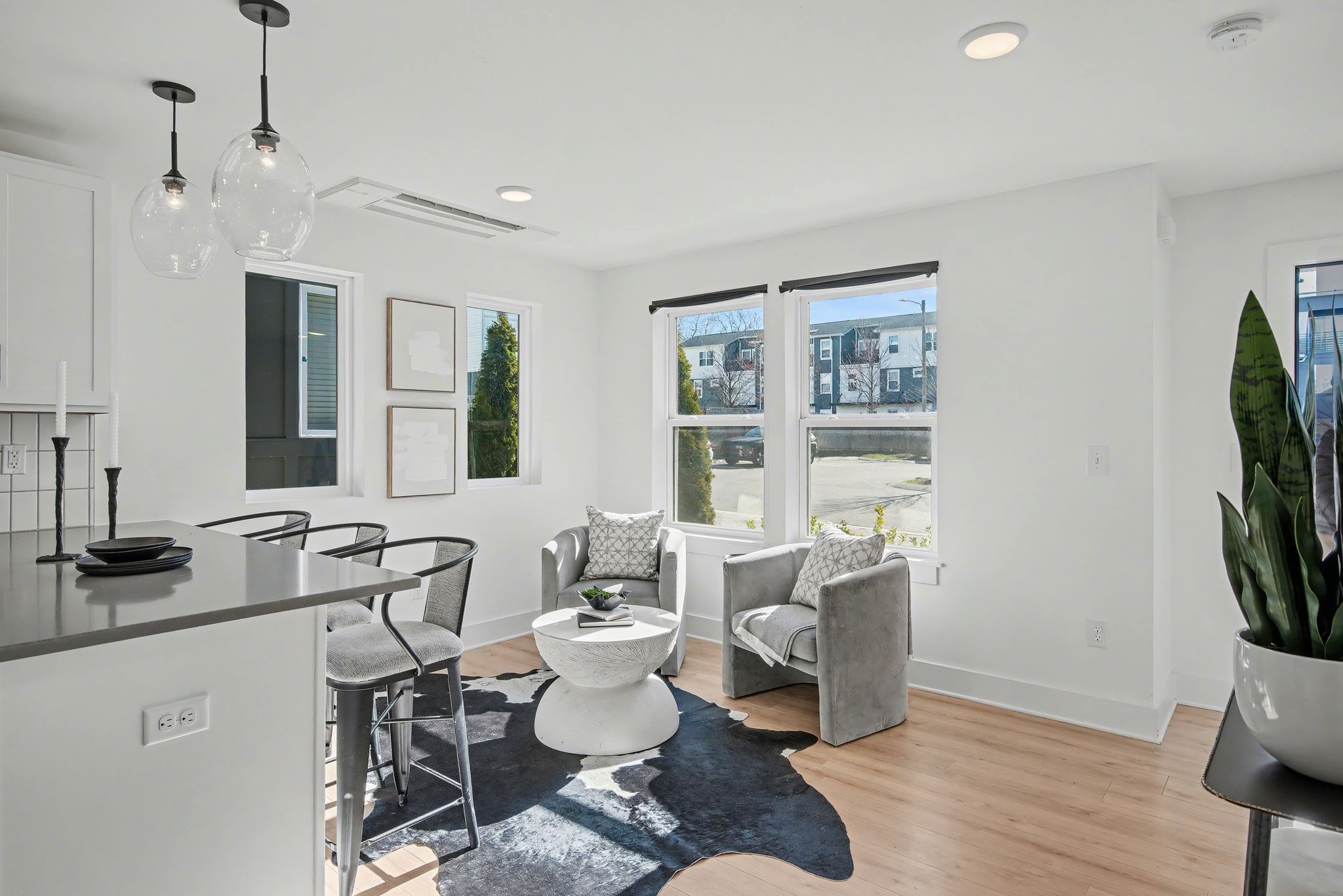 102 Duke Street, Unit 7 Nashville, TN 37207 - Photo 3 of 25 a living room with furniture a flat screen tv and a window