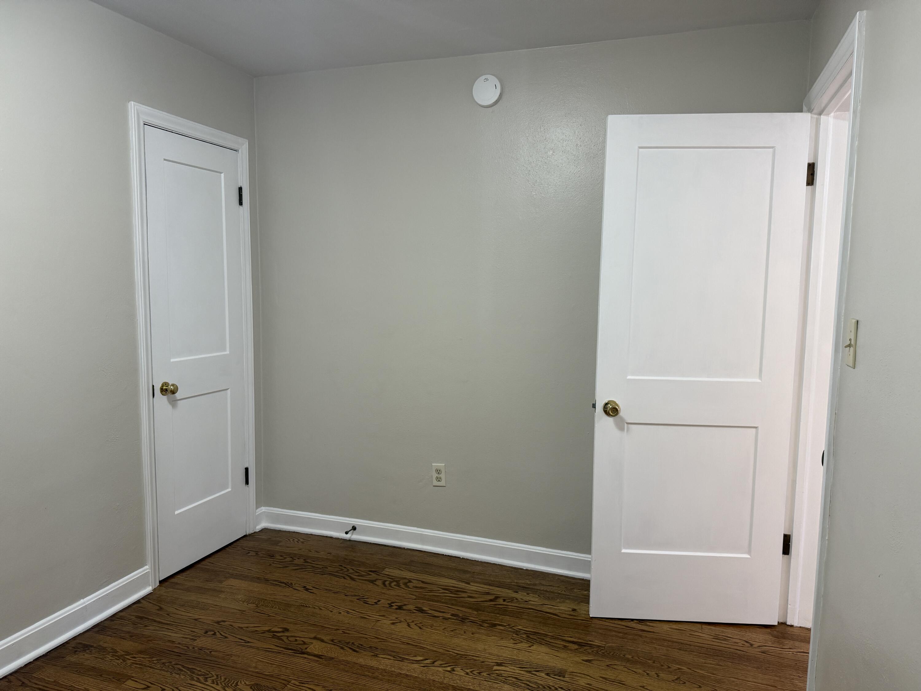 222 Ross Street Salem, VA 24153 - Photo 14 of 20 a view of an empty room with wooden floor