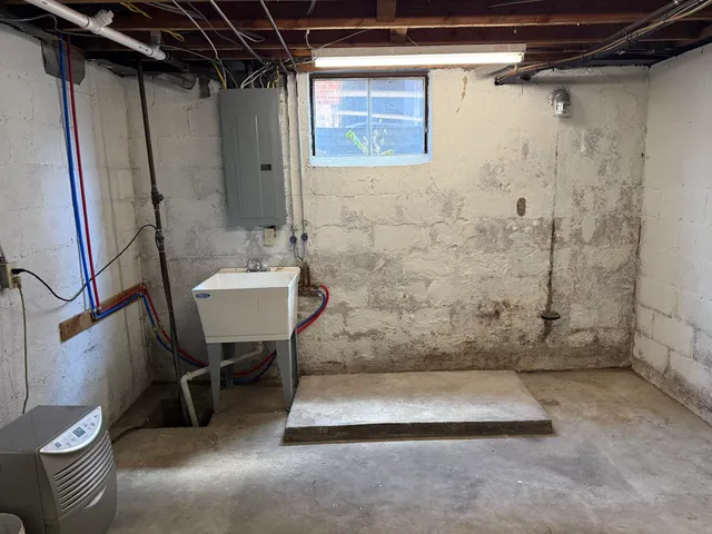 a bathroom with a sink and a shower