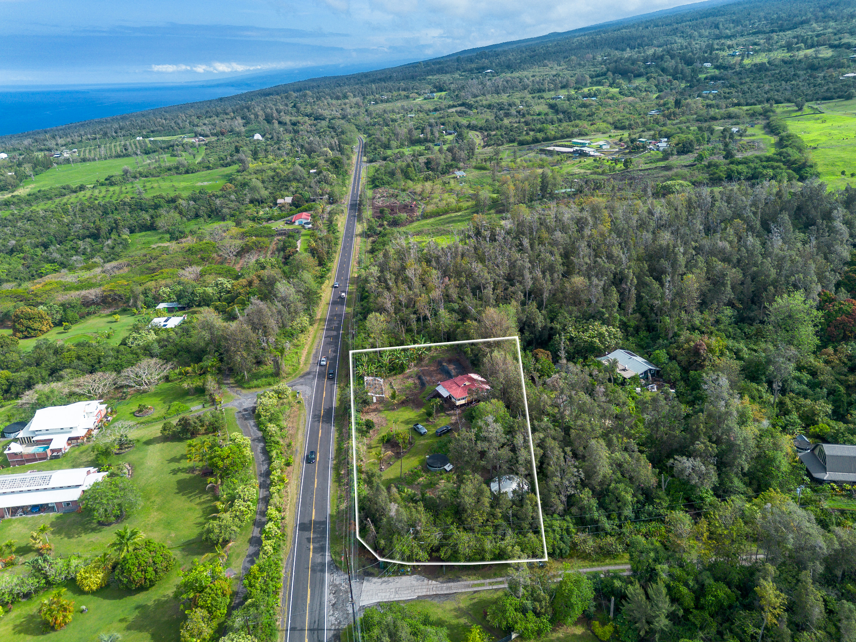 89-1426 Hawaii Belt Road Captain Cook, HI 96704 - Photo 20 of 30 a view of a forest from a balcony