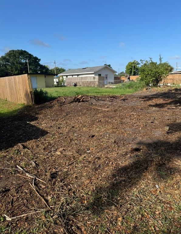 4100 West Robinson Street Orlando, FL 32805 - Photo 3 of 6 a view of a field with plants and trees
