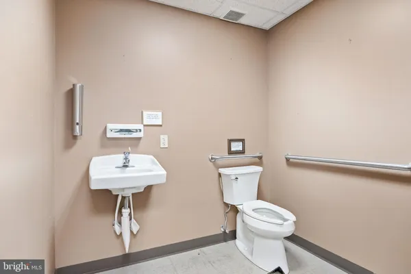 a view of a hallway with entryway door