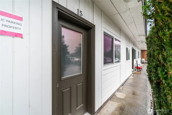 a hallway with a door and a hallway