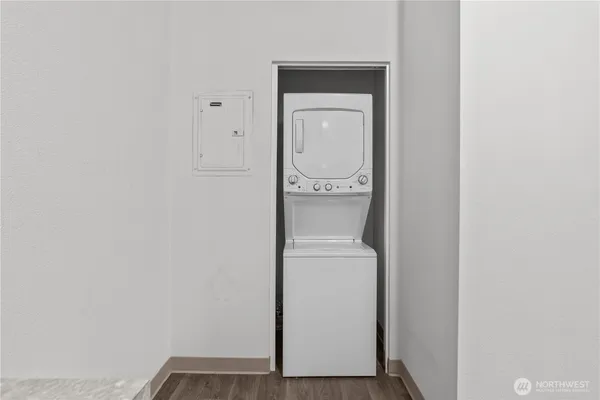 a view of a bathroom with a washer and dryer
