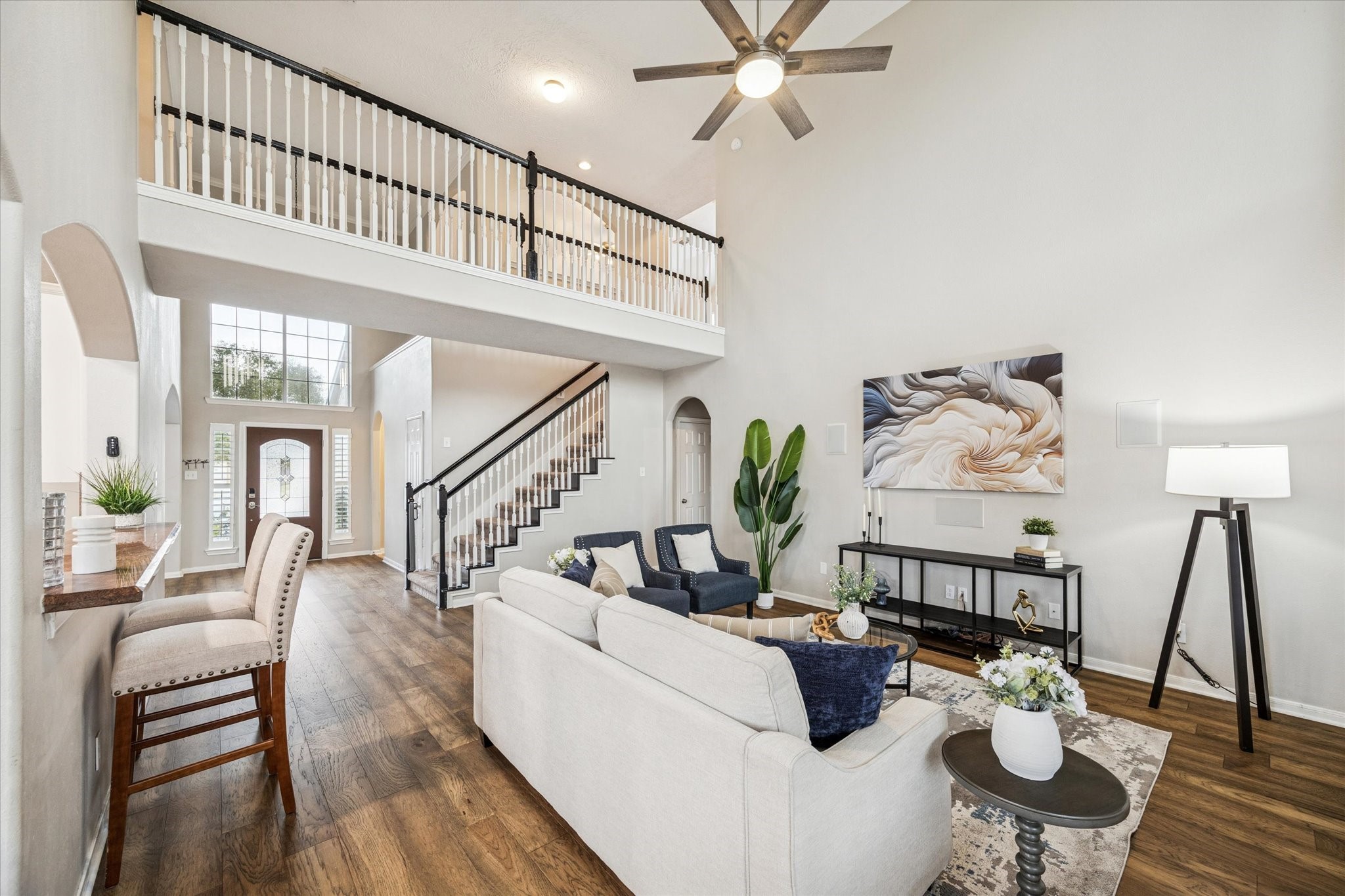 7243 Emerald Run Lane Spring, TX 77379 - Photo 11 of 35 a living room with furniture and wooden floor