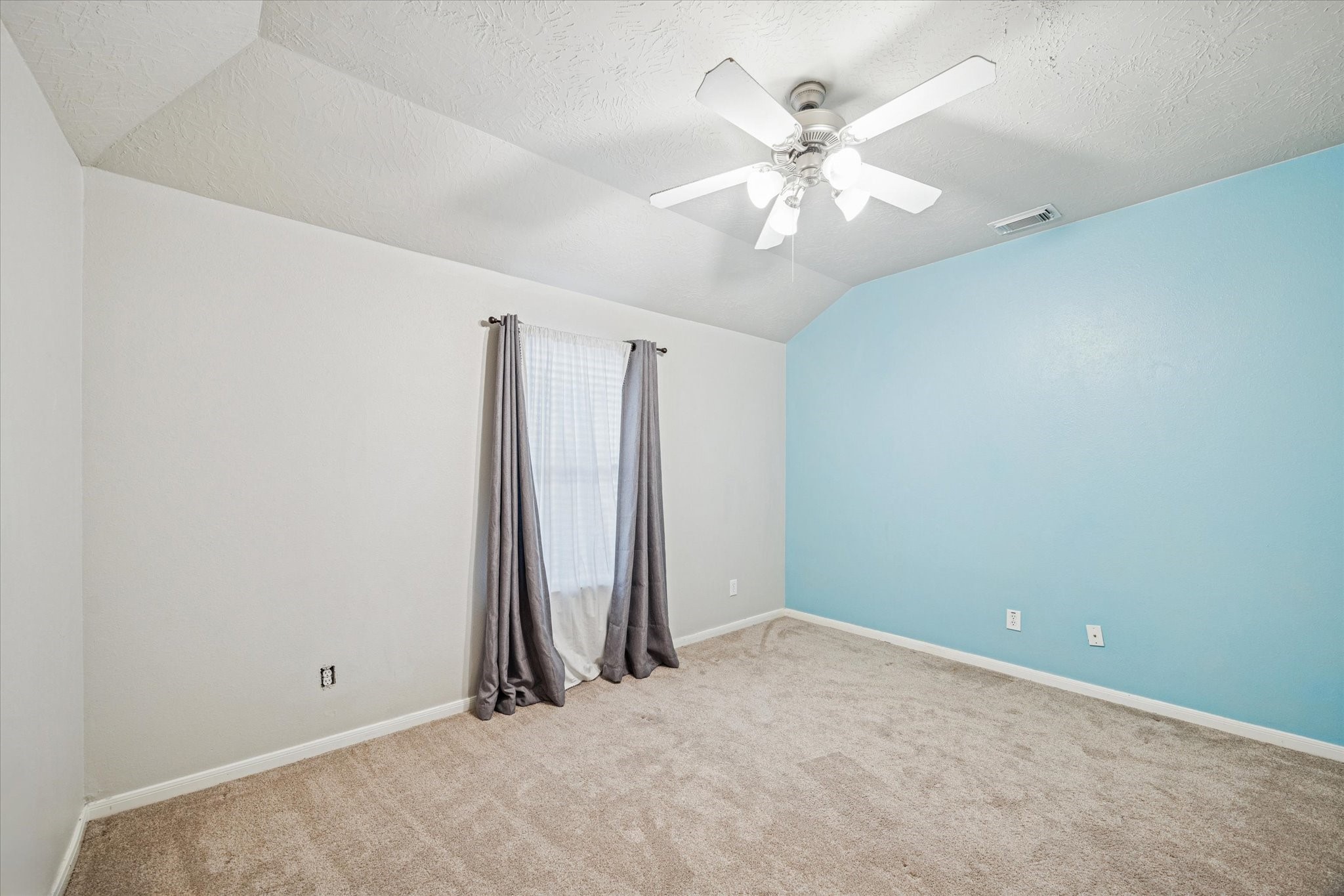 7243 Emerald Run Lane Spring, TX 77379 - Photo 25 of 35 an empty room with chandelier fan and closet area