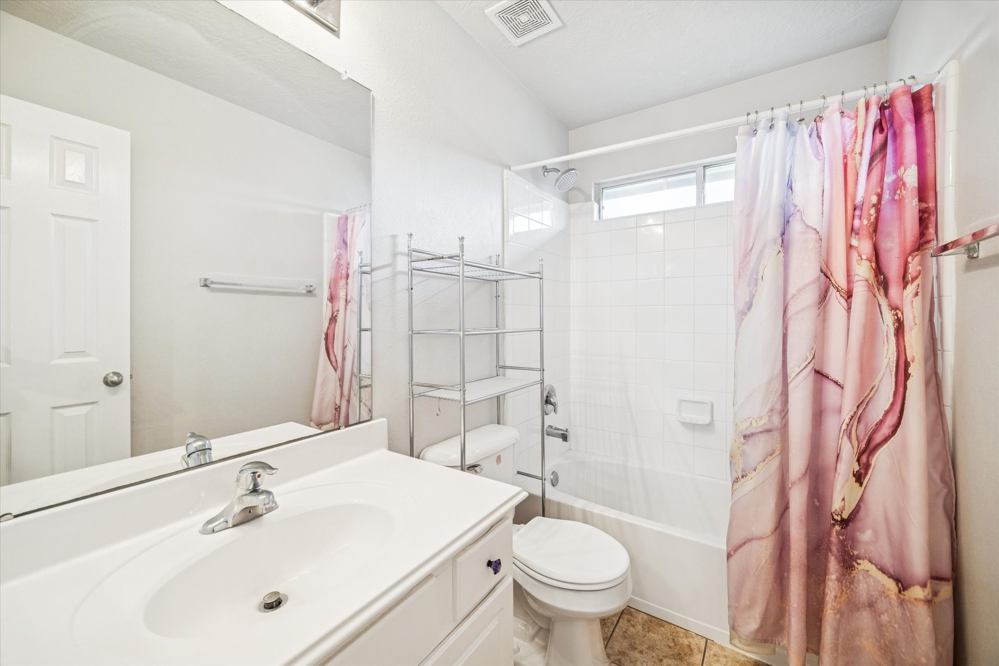 7243 Emerald Run Lane Spring, TX 77379 - Photo 29 of 35 a bathroom with a sink toilet and shower