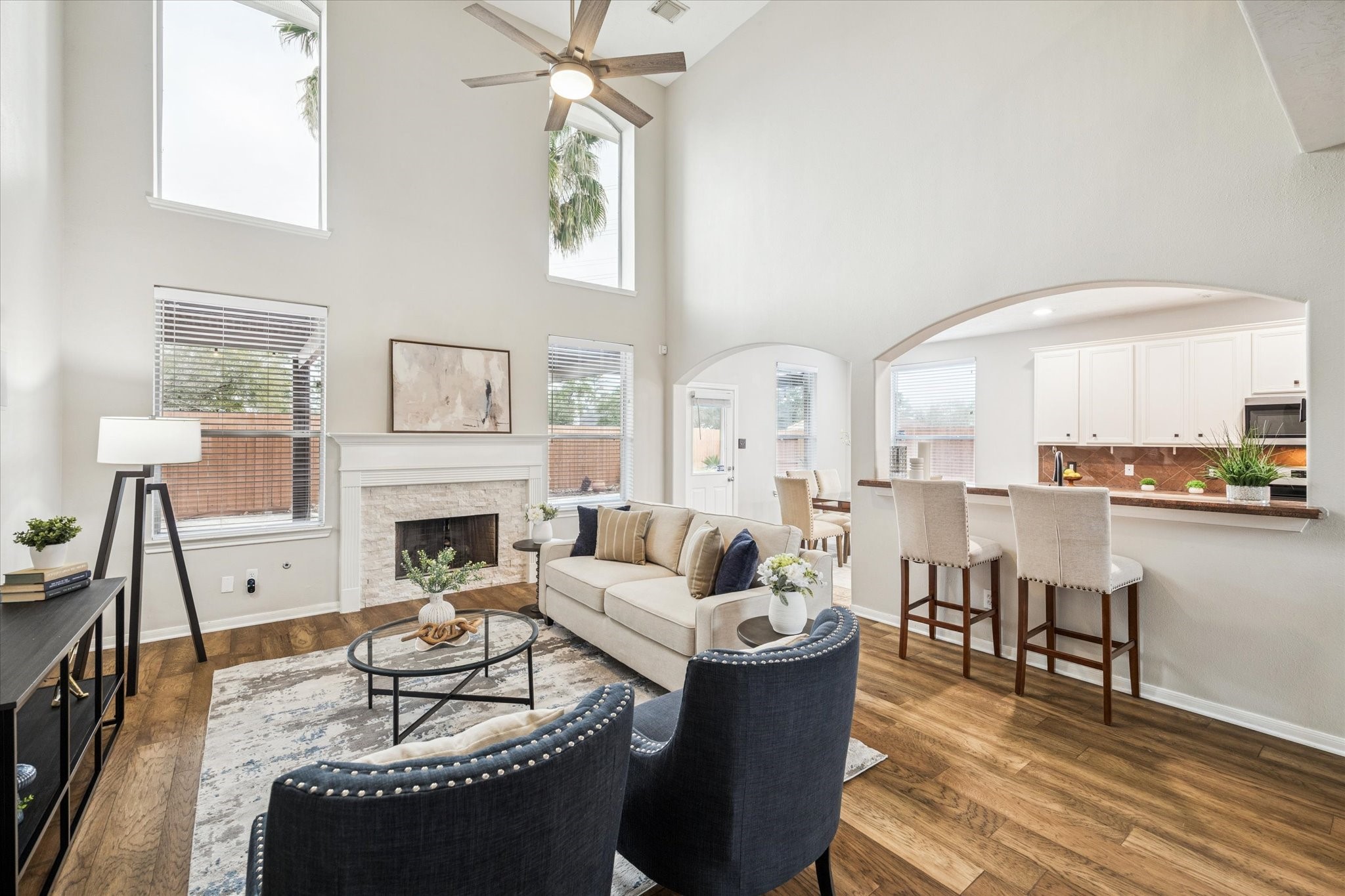 7243 Emerald Run Lane Spring, TX 77379 - Photo 10 of 35 a living room with furniture a fireplace and a table