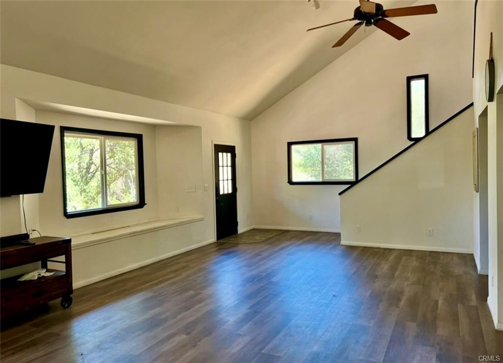 3568 Manzanita Road Mariposa, CA 95338 - Photo 8 of 17 a view of a livingroom with wooden floor and a window