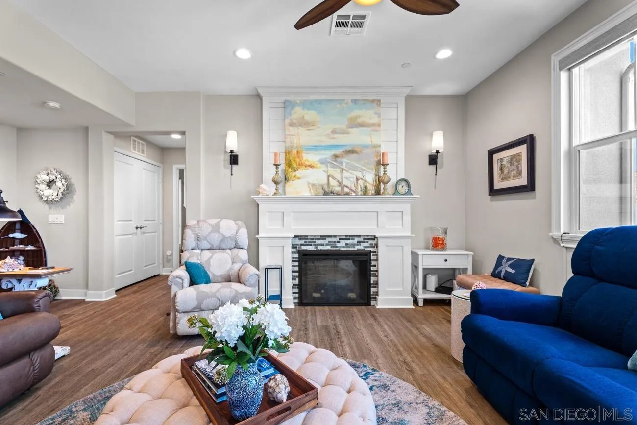 4326 Star Path Way, Unit 1 Oceanside, CA 92056 - Photo 14 of 46 a living room with furniture and a fireplace