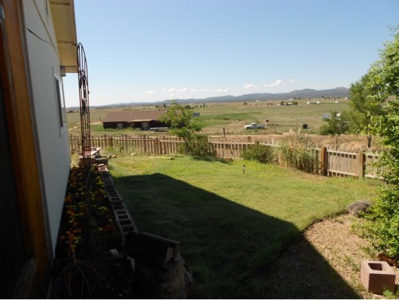 3260 West Ron Road, Unit 2 Paulden, AZ 86334 - Photo 13 of 17 a view of a lake with a big yard