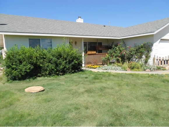 3260 West Ron Road, Unit 2 Paulden, AZ 86334 - Photo 17 of 17 a view of a house with a yard