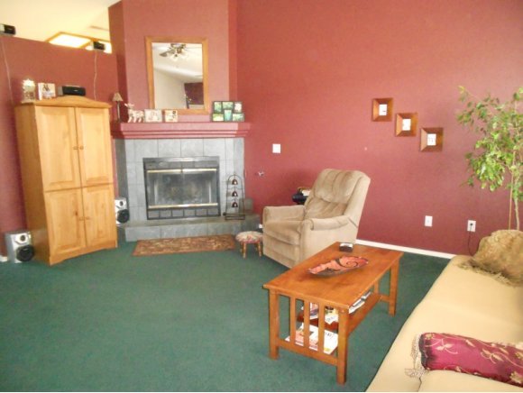3260 West Ron Road, Unit 2 Paulden, AZ 86334 - Photo 2 of 17 a living room with furniture and a fireplace