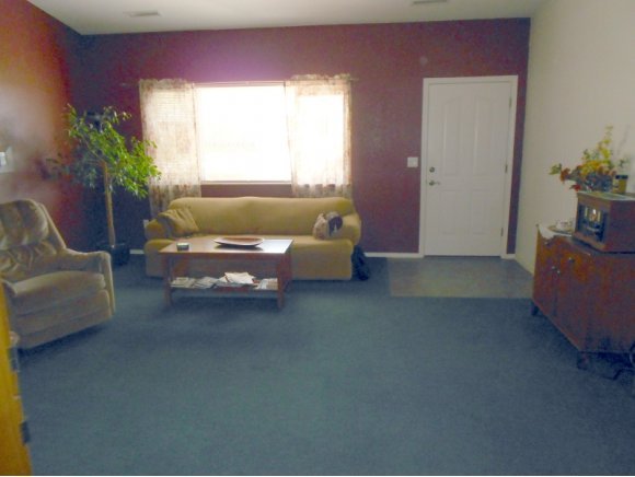 3260 West Ron Road, Unit 2 Paulden, AZ 86334 - Photo 3 of 17 a living room with furniture and a potted plant