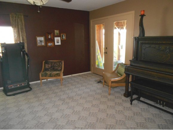 3260 West Ron Road, Unit 2 Paulden, AZ 86334 - Photo 5 of 17 a living room with furniture a air conditioner vent and a window