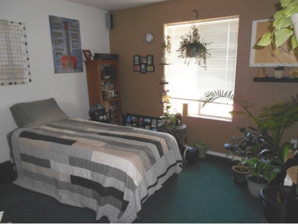3260 West Ron Road, Unit 2 Paulden, AZ 86334 - Photo 8 of 17 a bedroom with bed and window