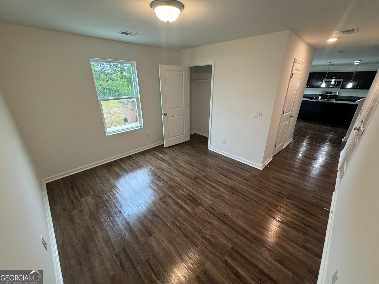 435 Wilkins Road Midway, GA 31320 - Photo 7 of 22 an entryway with wooden floor