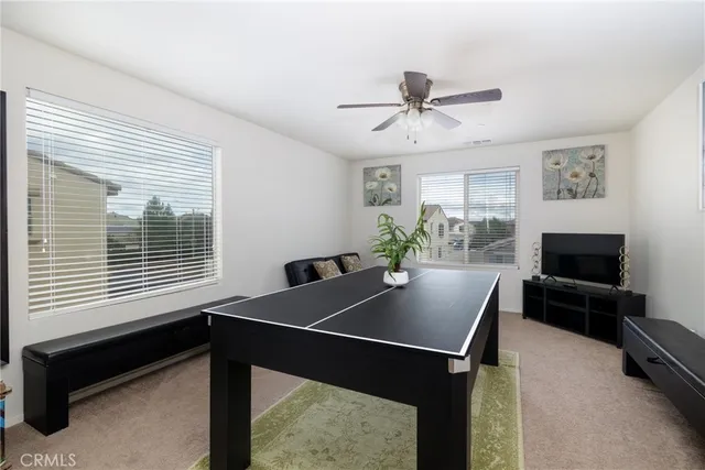 a view of a workspace with furniture