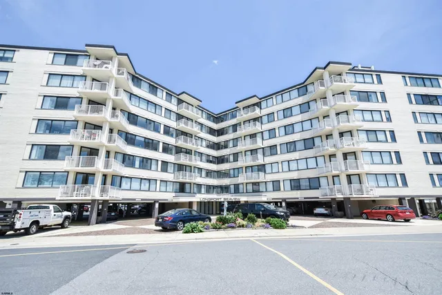 a front view of a building with street view