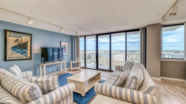 a living room with furniture and a table