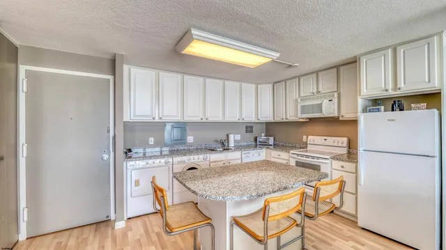 a view of a balcony with an outdoor space