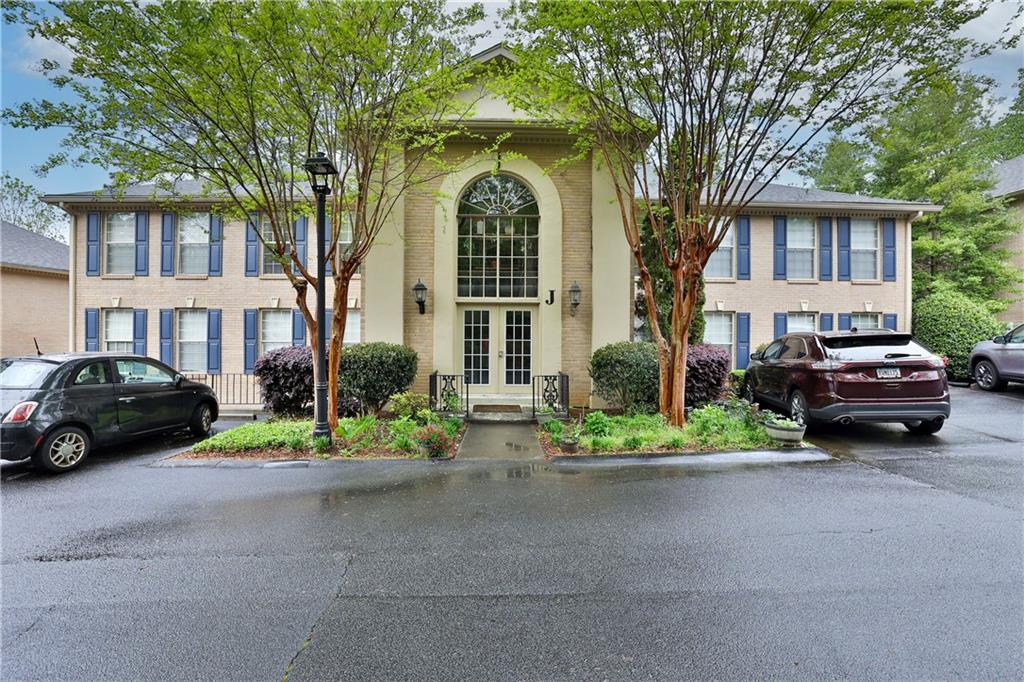 750 Dalrymple Road, Unit J2 Atlanta, GA 30328 - Photo 1 of 1 a house view with a outdoor space