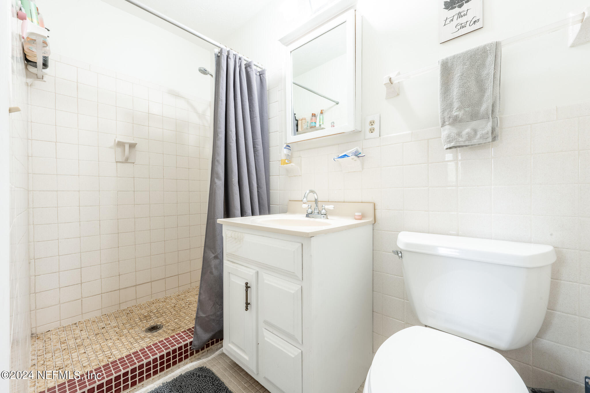 301 Penman Road Neptune Beach, FL 32266 - Photo 15 of 31 a bathroom with a sink toilet and shower