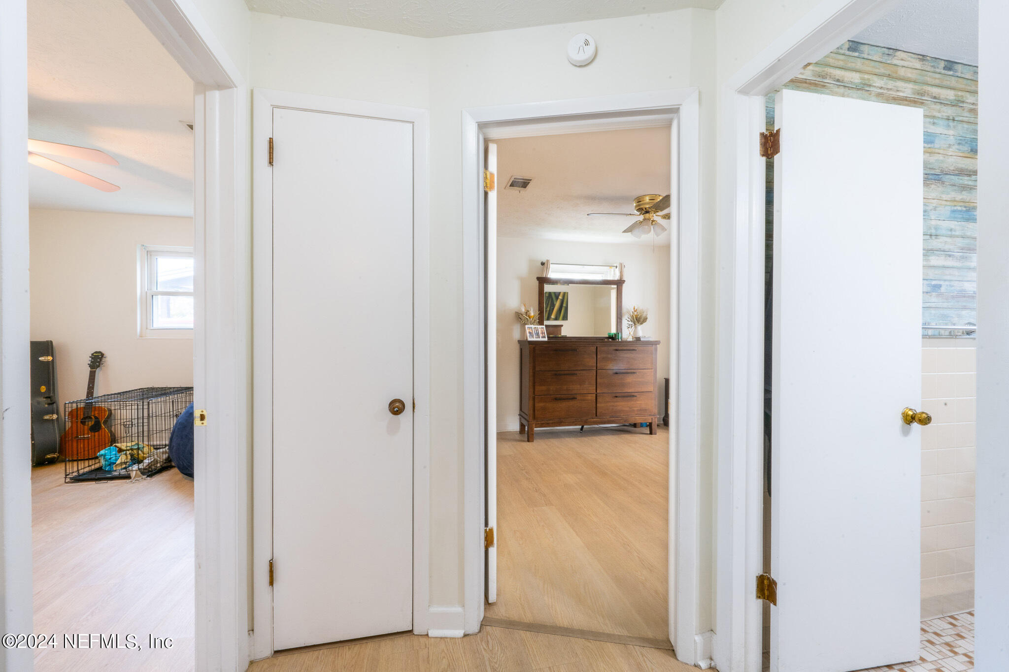 301 Penman Road Neptune Beach, FL 32266 - Photo 23 of 31 a view of a hallway with furniture and a livingroom view