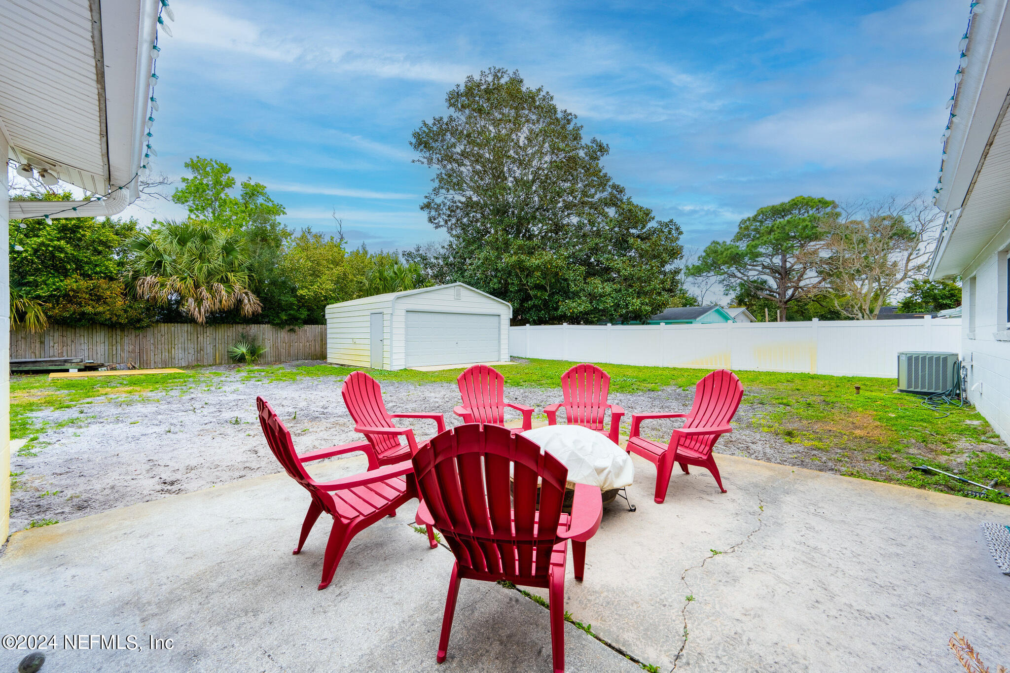 301 Penman Road Neptune Beach, FL 32266 - Photo 24 of 31 a view of backyard with swimming pool and outdoor seating